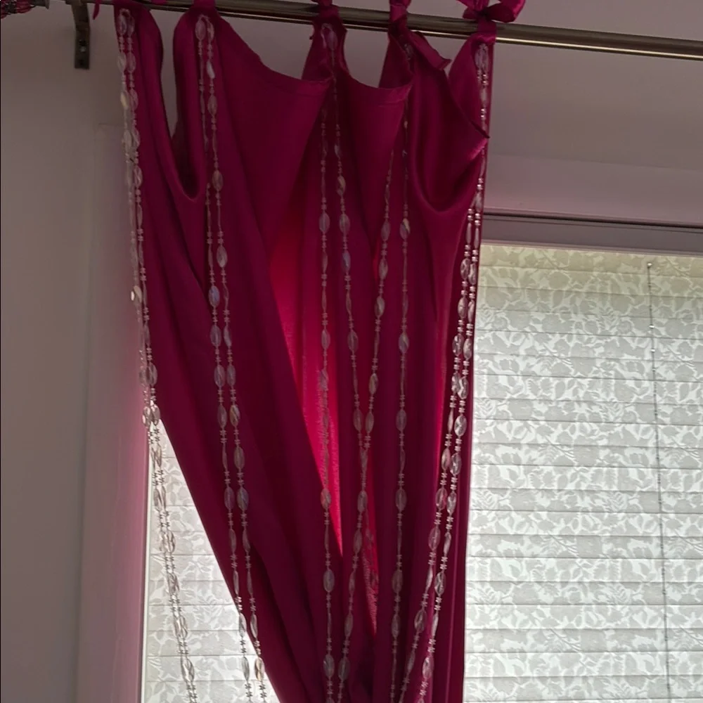 Vibrant Pink Curtains with clear hanging beads